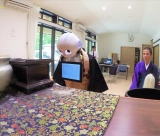 Người máy Nhật phục vụ tang lễ y như người thật